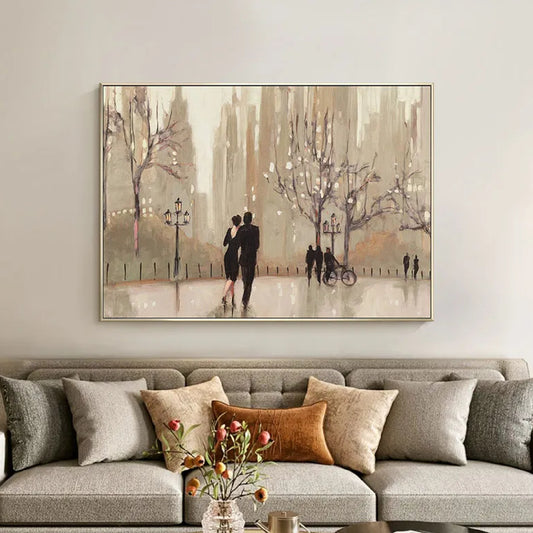 Room mockup. A couple walks through a muted beige park among bare trees, streetlamps, distant figures and a bicycle.