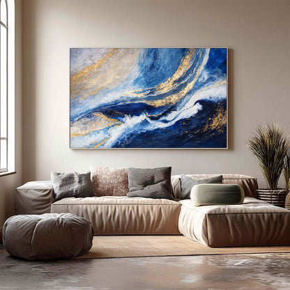 Living room with a large abstract painting on the wall above a beige sofa.