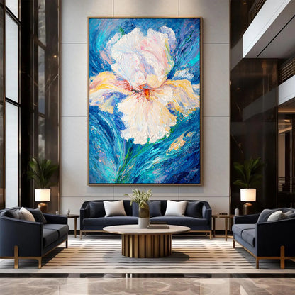 Modern living room with a large abstract floral painting on the wall.