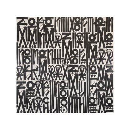 Black and white patterned fabric with geometric shapes on a white background