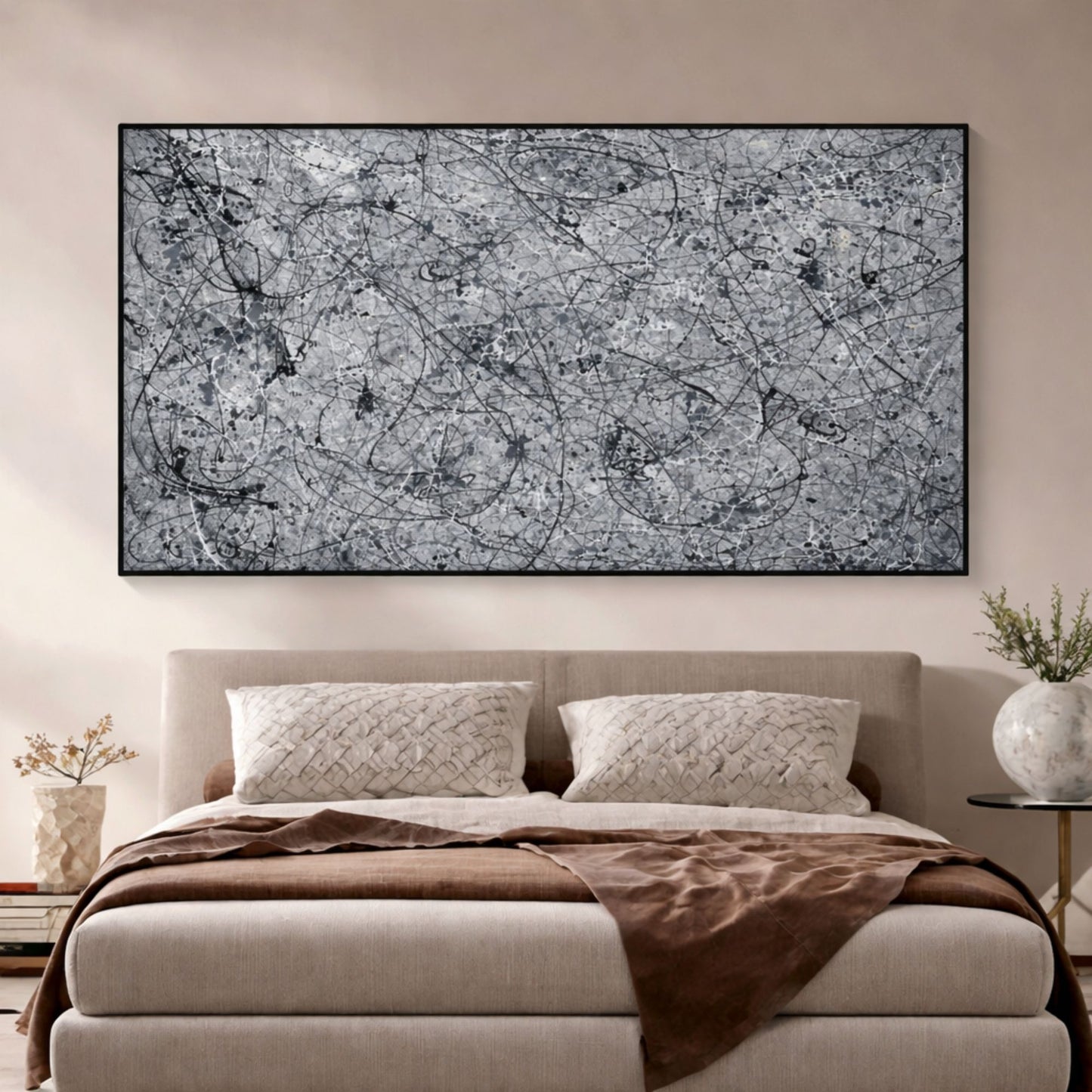Grey abstract drip painting with black lines mounted above bed in minimalist bedroom interior