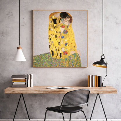 Gustav Klimt The Kiss reproduction framed above modern study desk with minimalist decor