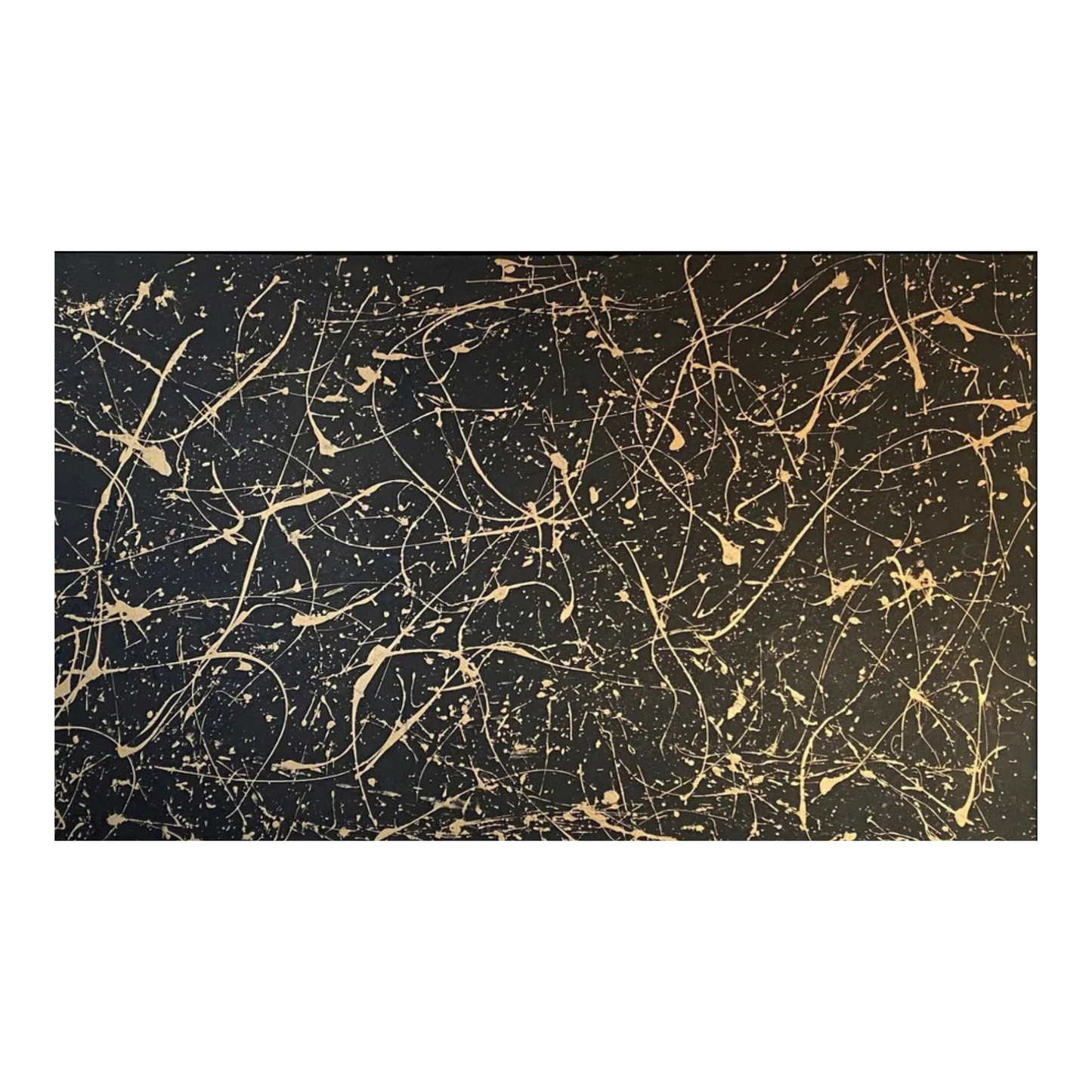 Black surface with gold abstract scratch pattern