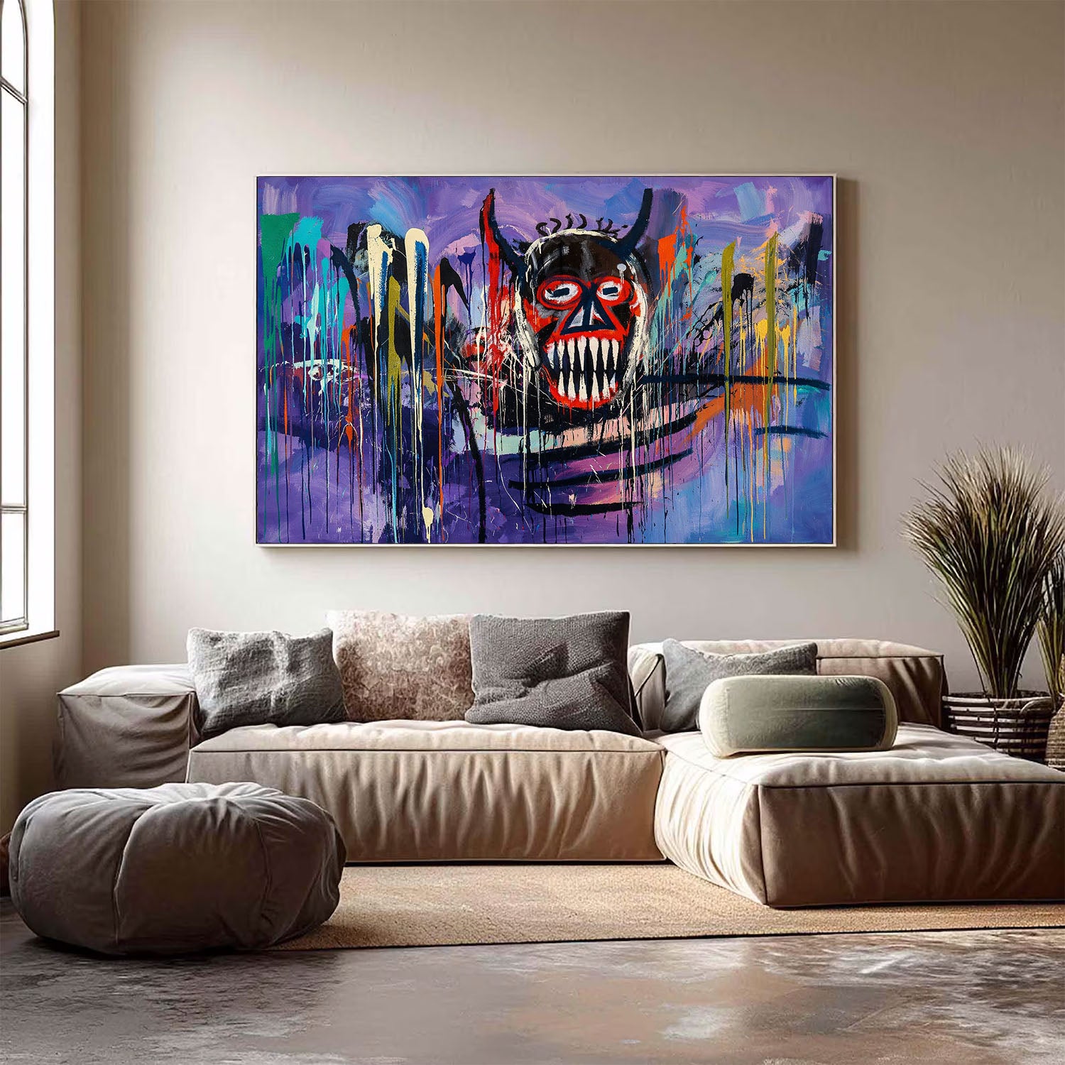 Colorful abstract painting of a mask on a wall above a modern sofa.