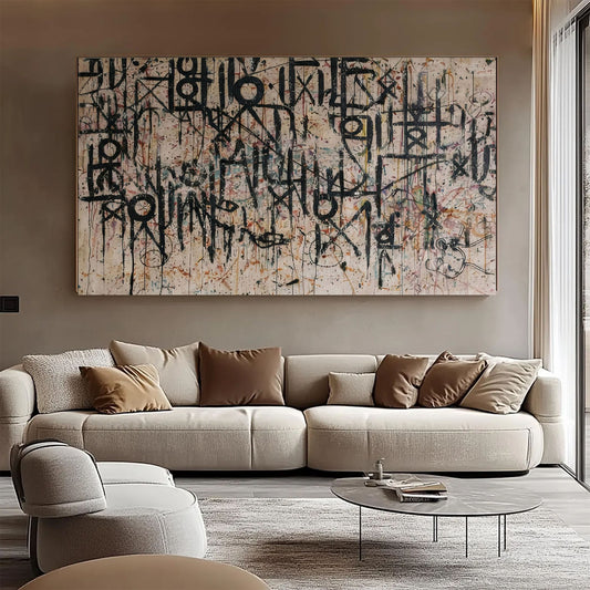 Modern living room with a large abstract painting on the wall above a beige sofa.