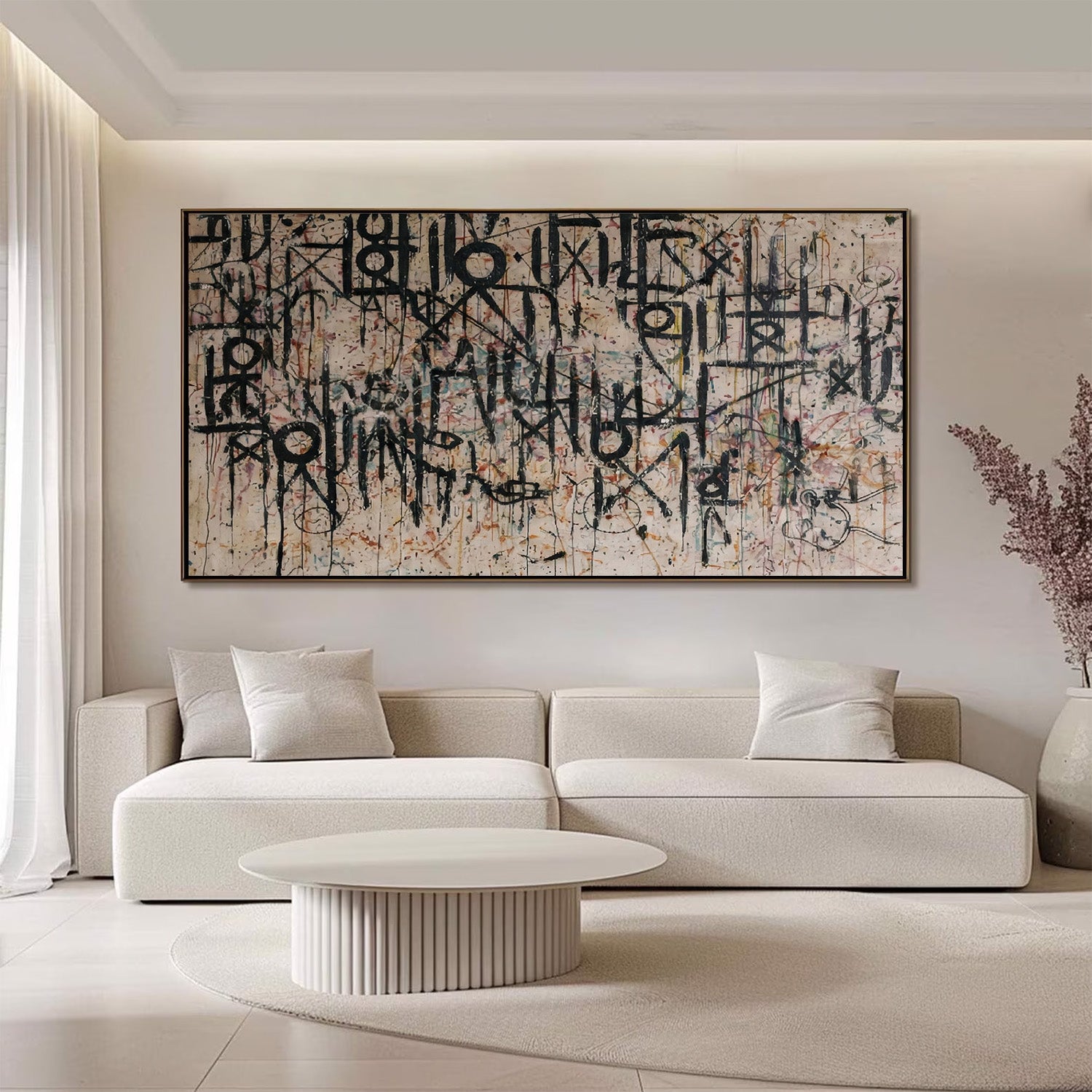 Modern living room with a large abstract painting on the wall above a white sofa.