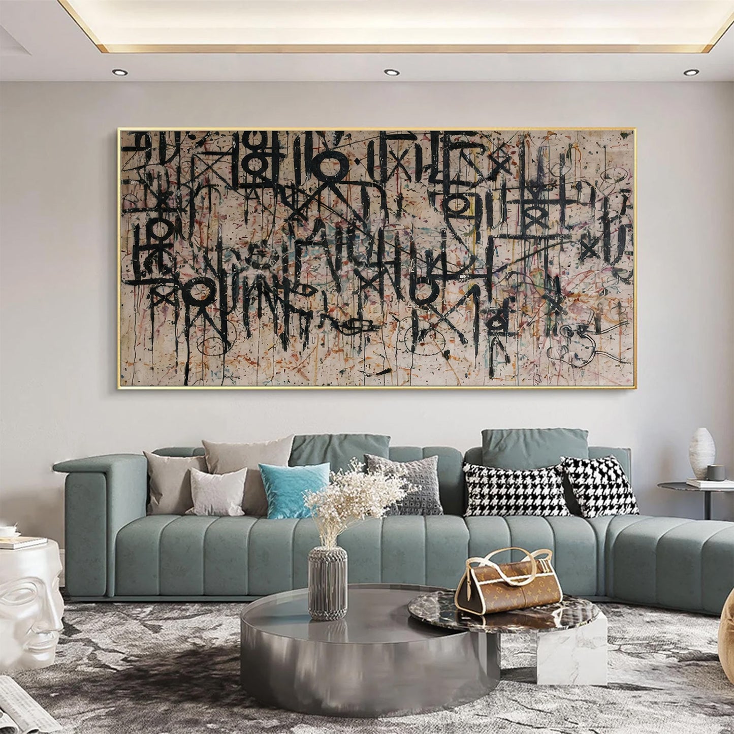 Modern living room with abstract art on the wall and a gray sofa.
