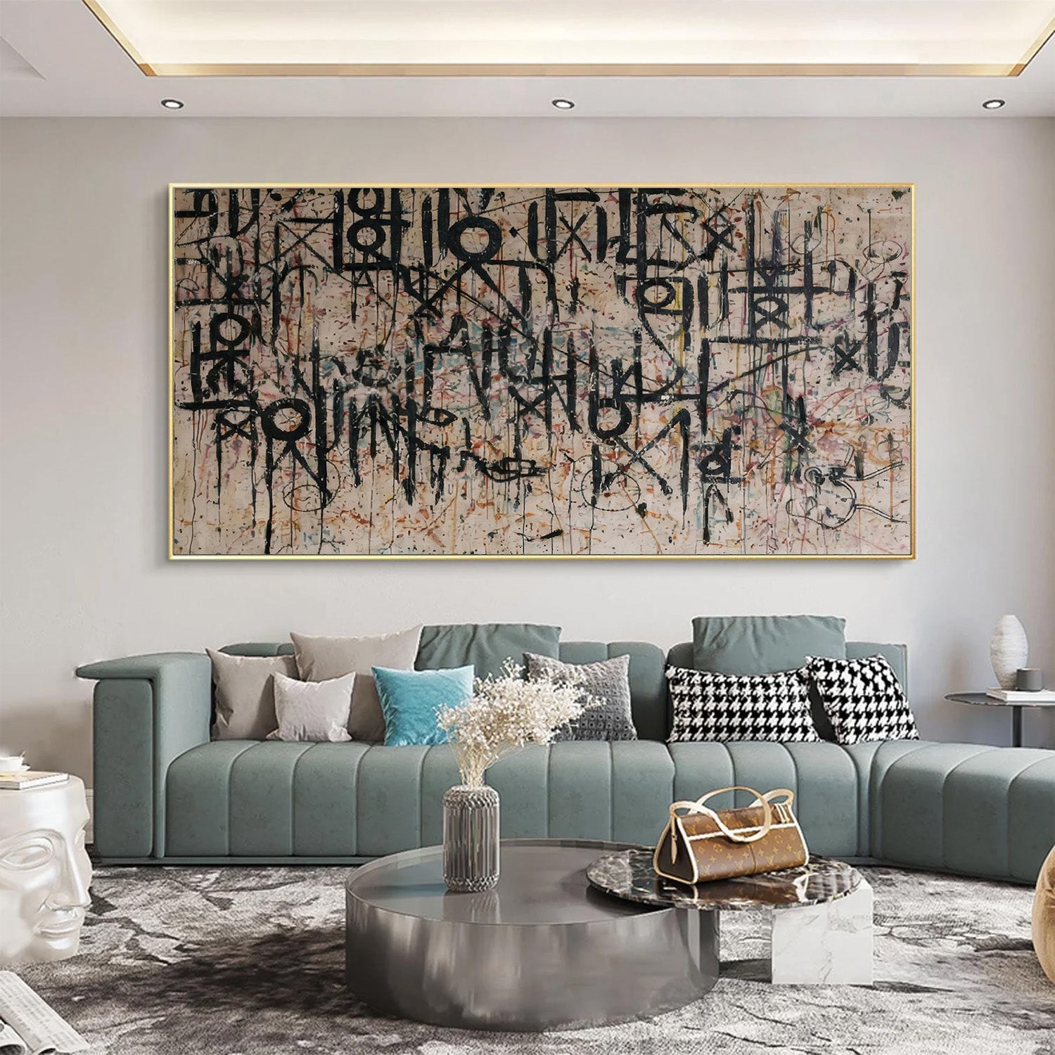 Modern living room with abstract art on the wall and a gray sofa.
