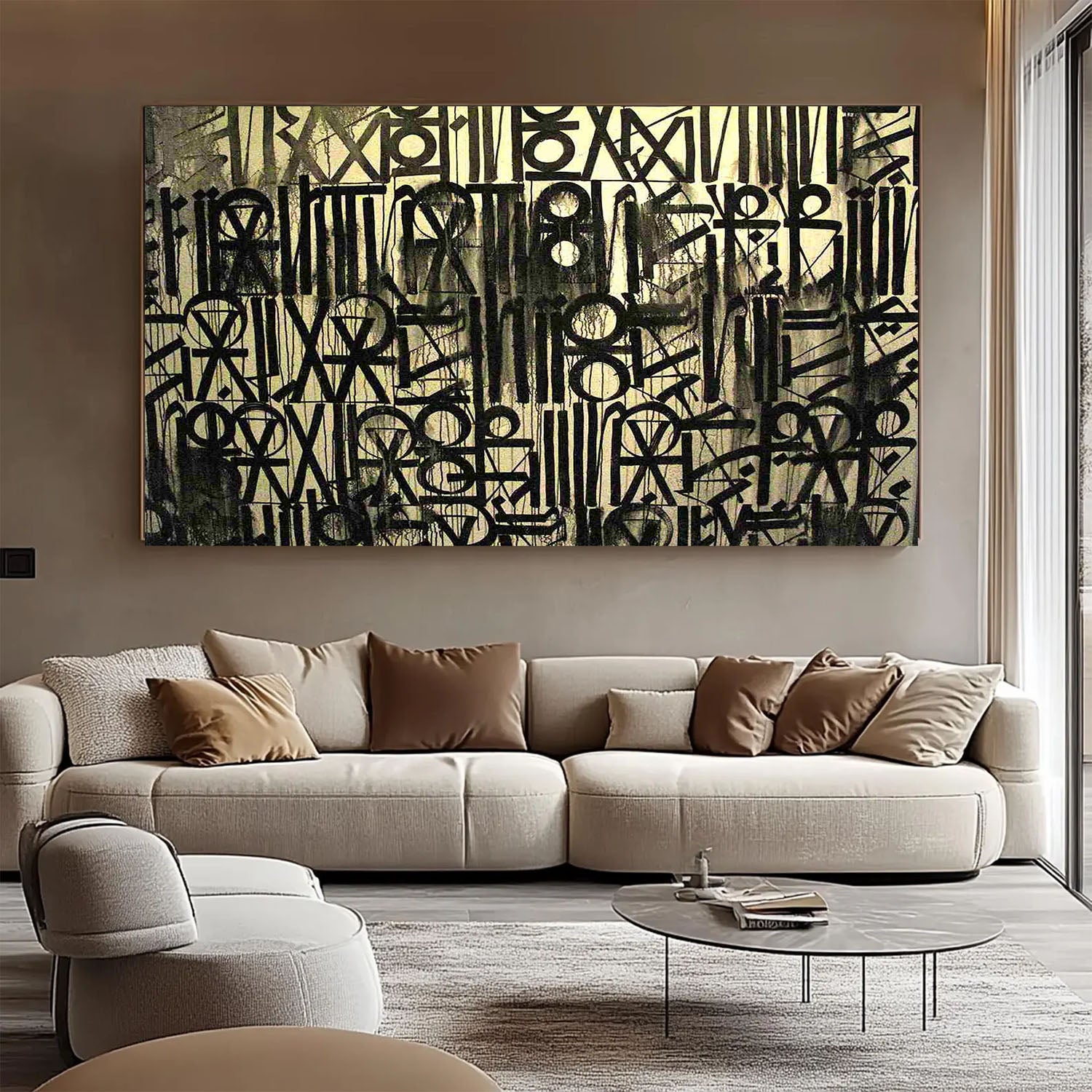 Abstract art piece on a wall above a beige sofa in a modern living room.