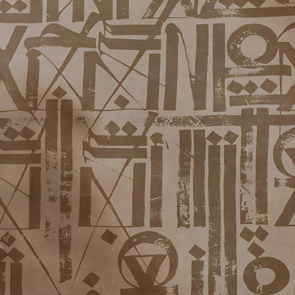 Detail of brown and beige abstract symbols arranged in a rhythmic grid.