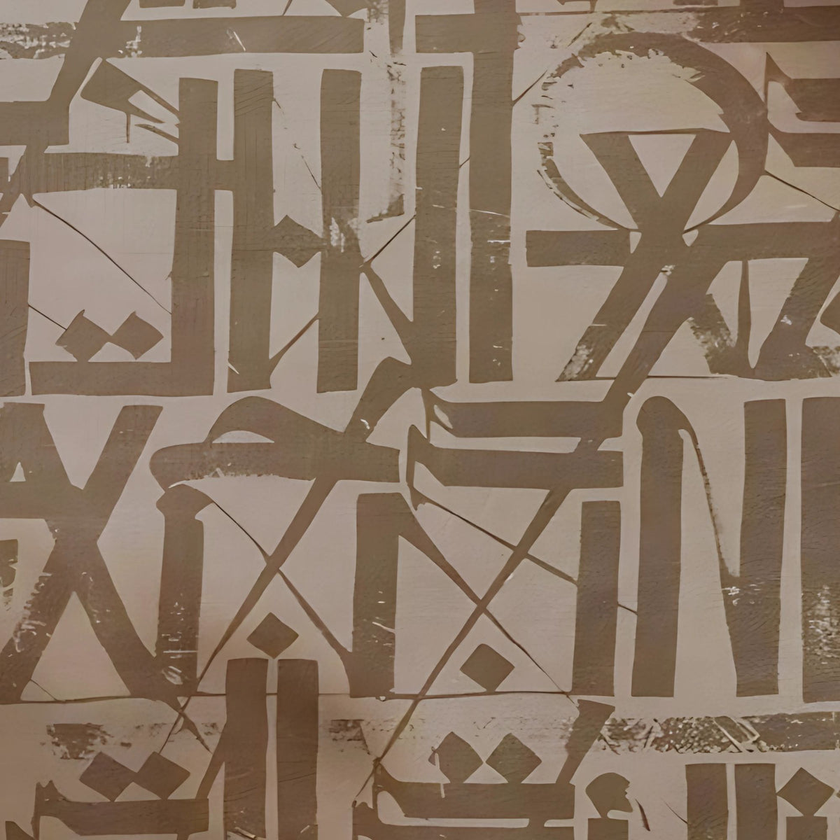 Detail of brown and beige abstract symbols arranged in a rhythmic grid.