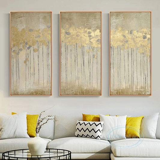 Room mockup showing three beige textured panels with clusters of gold-coloured flower heads on long thin dark stems.