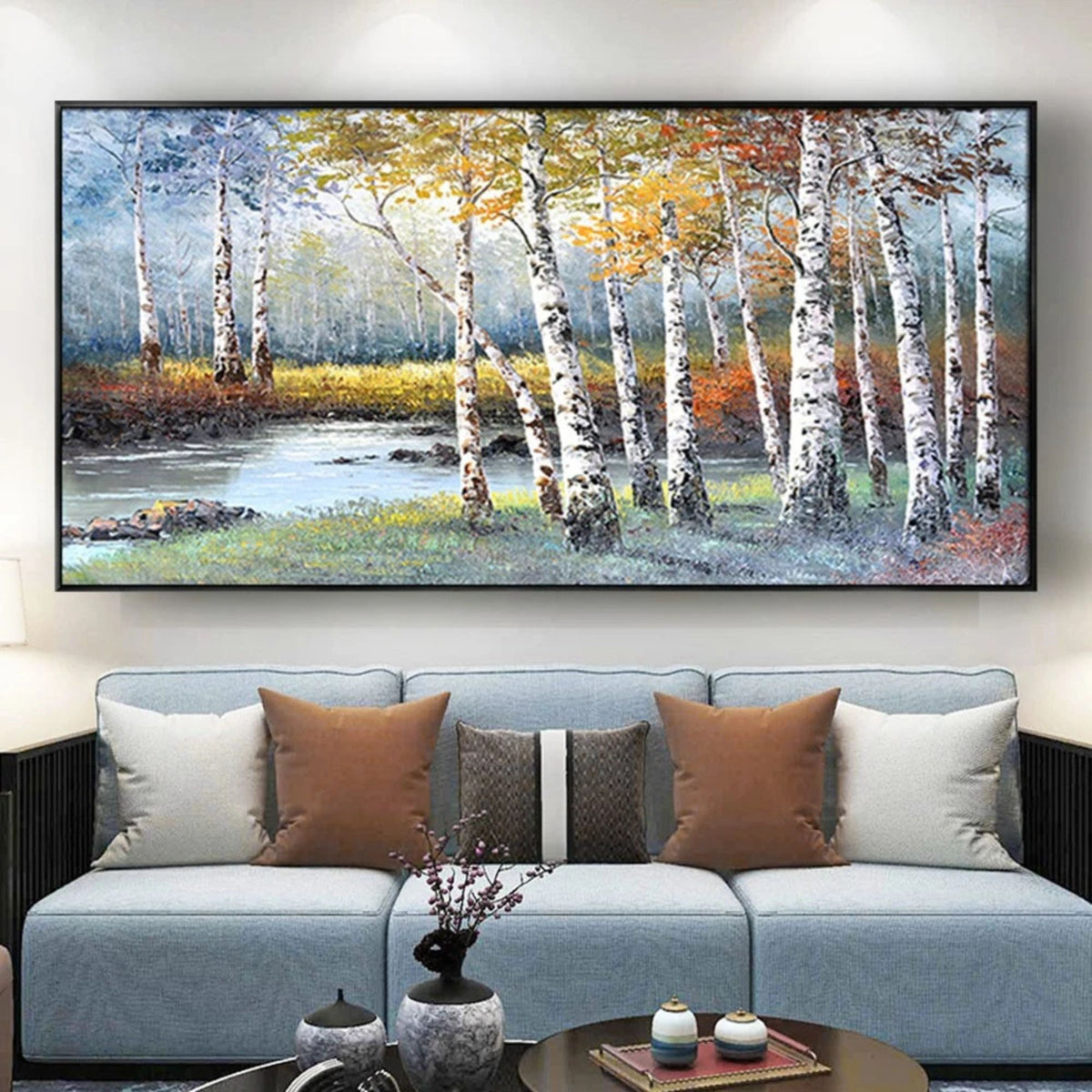 Room mockup showing white birch trunks beside a winding blue stream with yellow and orange foliage in a soft woodland landscape.