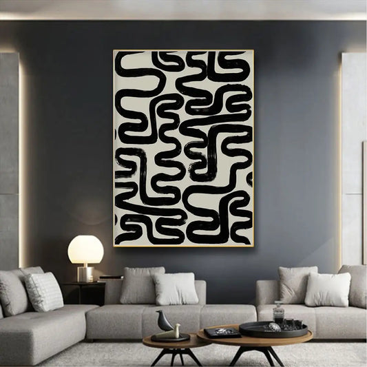 Room mockup showing bold irregular black looping lines covering a cream background in a maze-like abstract pattern.