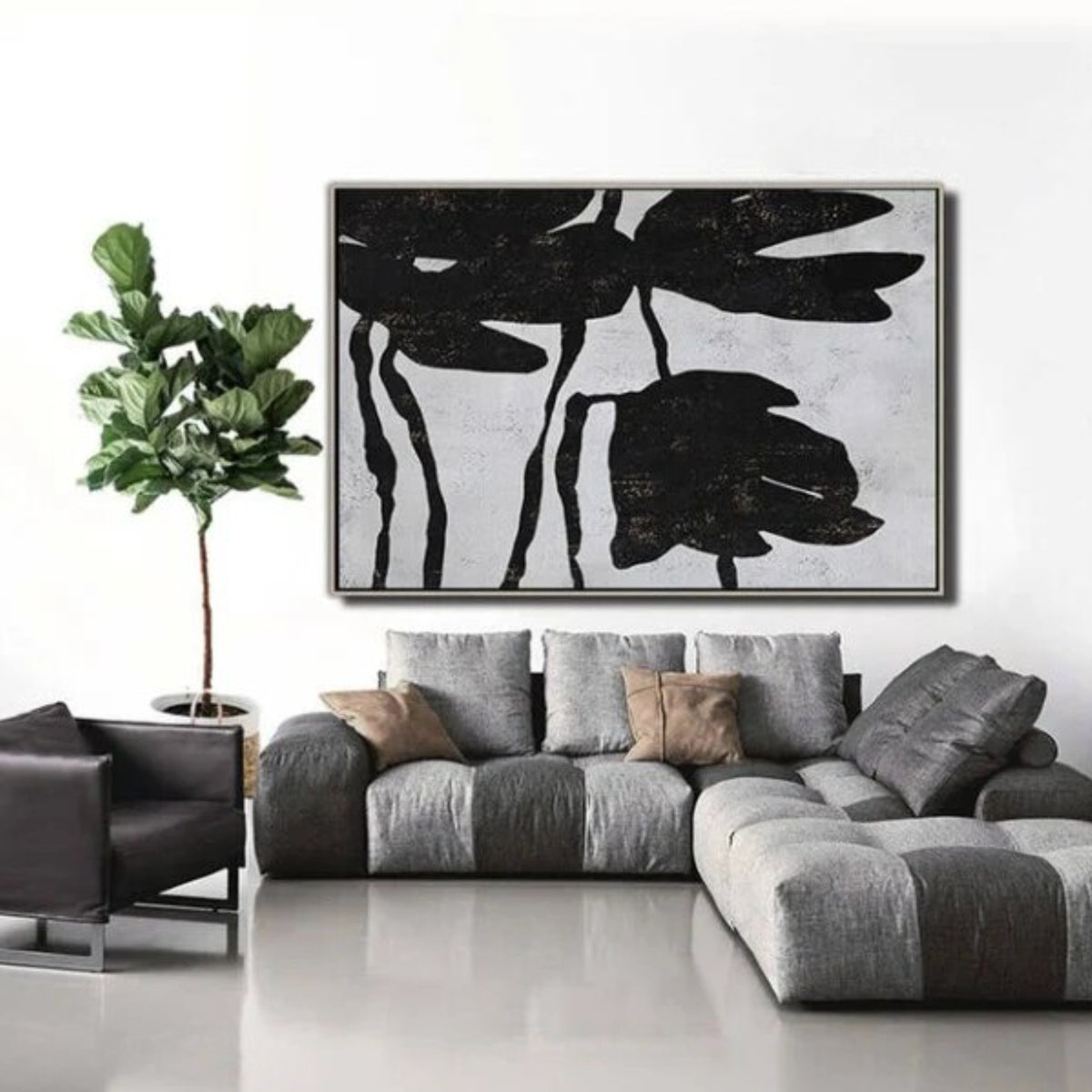 Room mockup. Large black flower silhouettes with drooping petals and thin stems on a pale grey textured background.