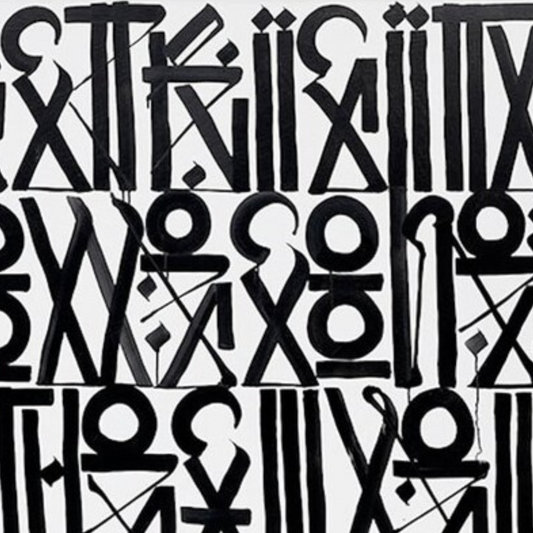 Close-up. Black circles, triangles and elongated letter-like symbols arranged in dense rows on white.