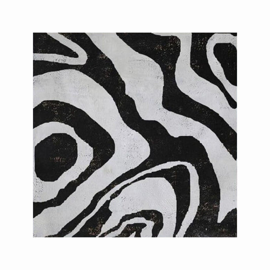 Black and white abstract pattern on a textured surface
