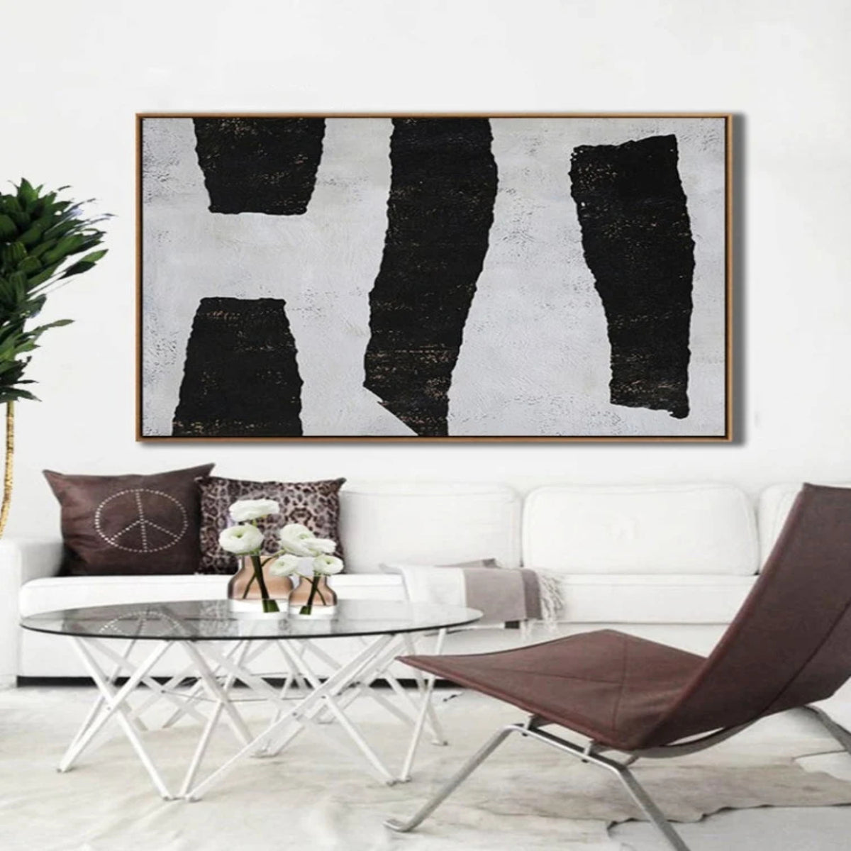 Room mockup. Four irregular black vertical bars stand against a white textured background.