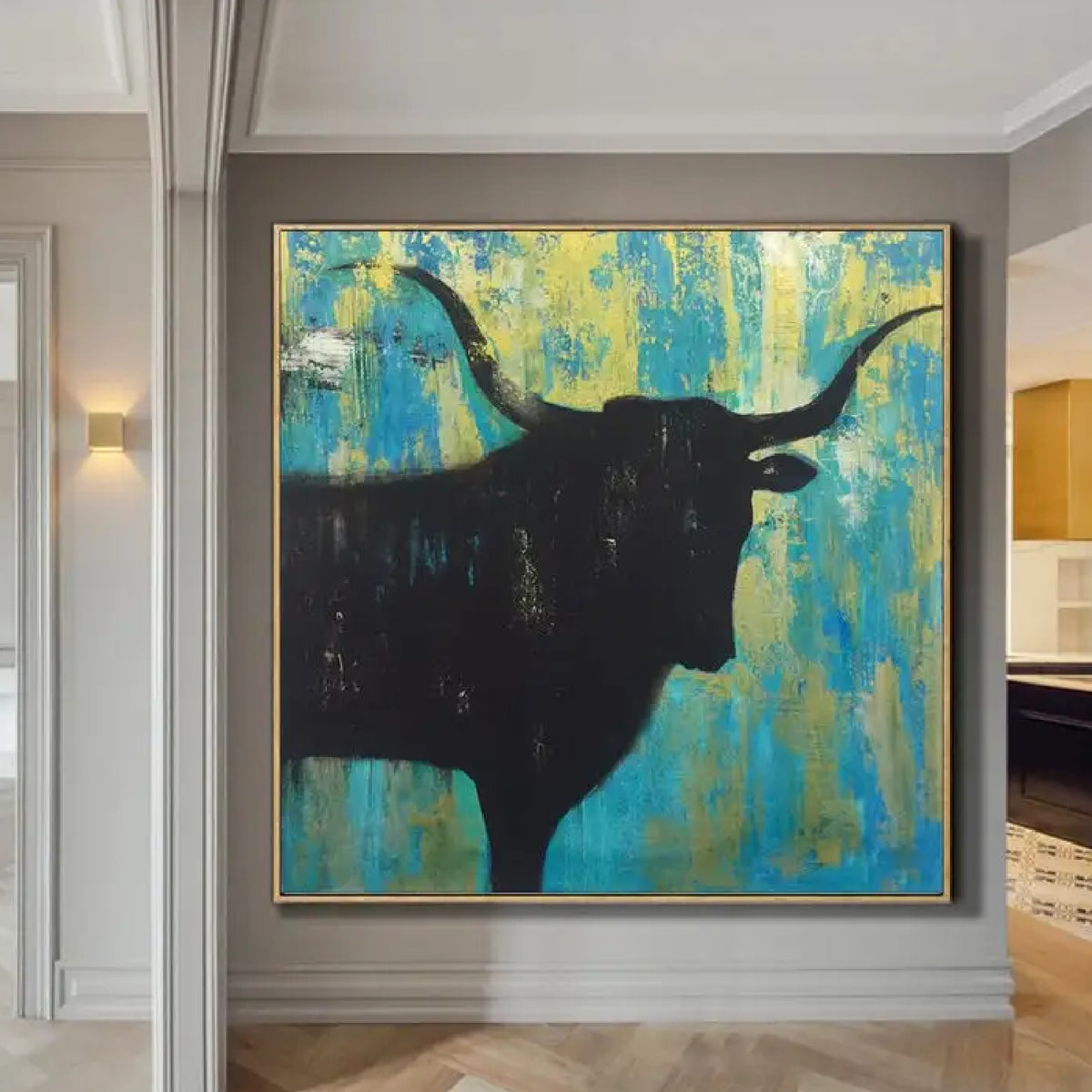 Room mockup. A black longhorn bull silhouette with wide curved horns against a rough turquoise and yellow background.