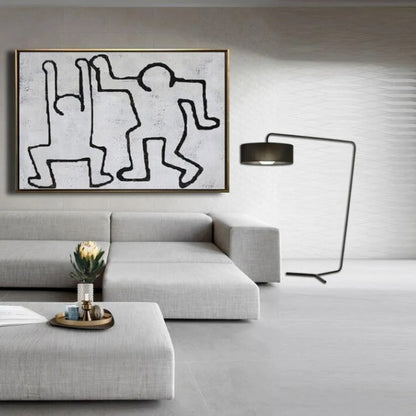 Room mockup. Two playful dancing figures drawn with continuous black outlines on a pale grey textured background.