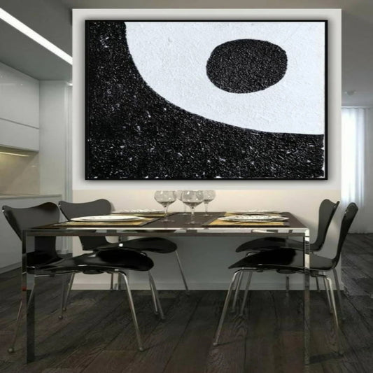 Room mockup. A black oval sits in a broad white curved field above a densely textured black lower area.