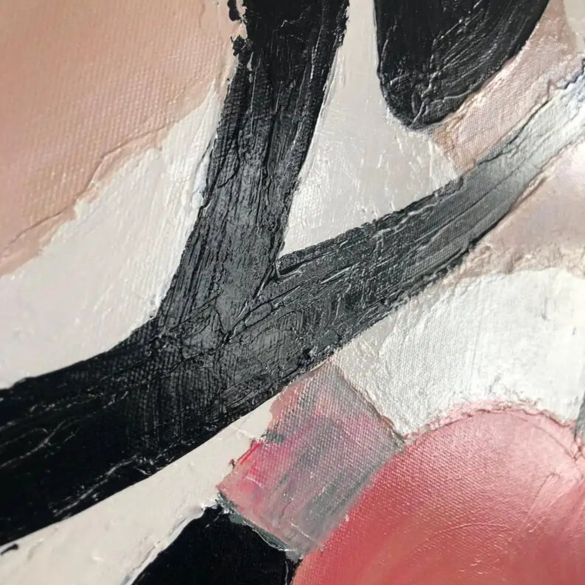 Close-up. Sweeping black curves overlap pale pink, cream and coral-red rounded patches with visible brush texture.