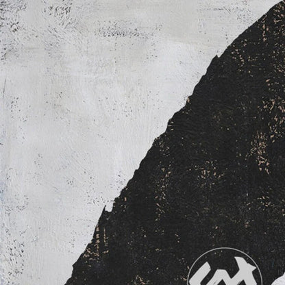 Close-up. Rounded black rectangle, oval and short vertical shapes on a pale grey textured background.
