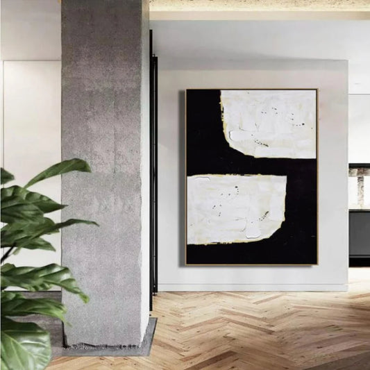 Room mockup. A broad black angular shape separates two irregular white blocks, with fine gold-coloured edges and visible texture.