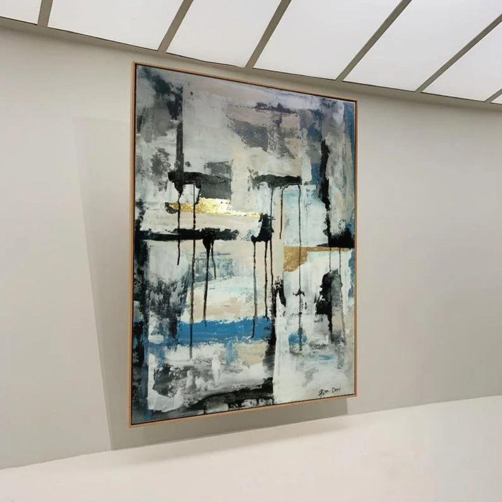 Room mockup showing black vertical drips and horizontal marks over pale grey-white fields with a blue band and small gold-coloured accents.