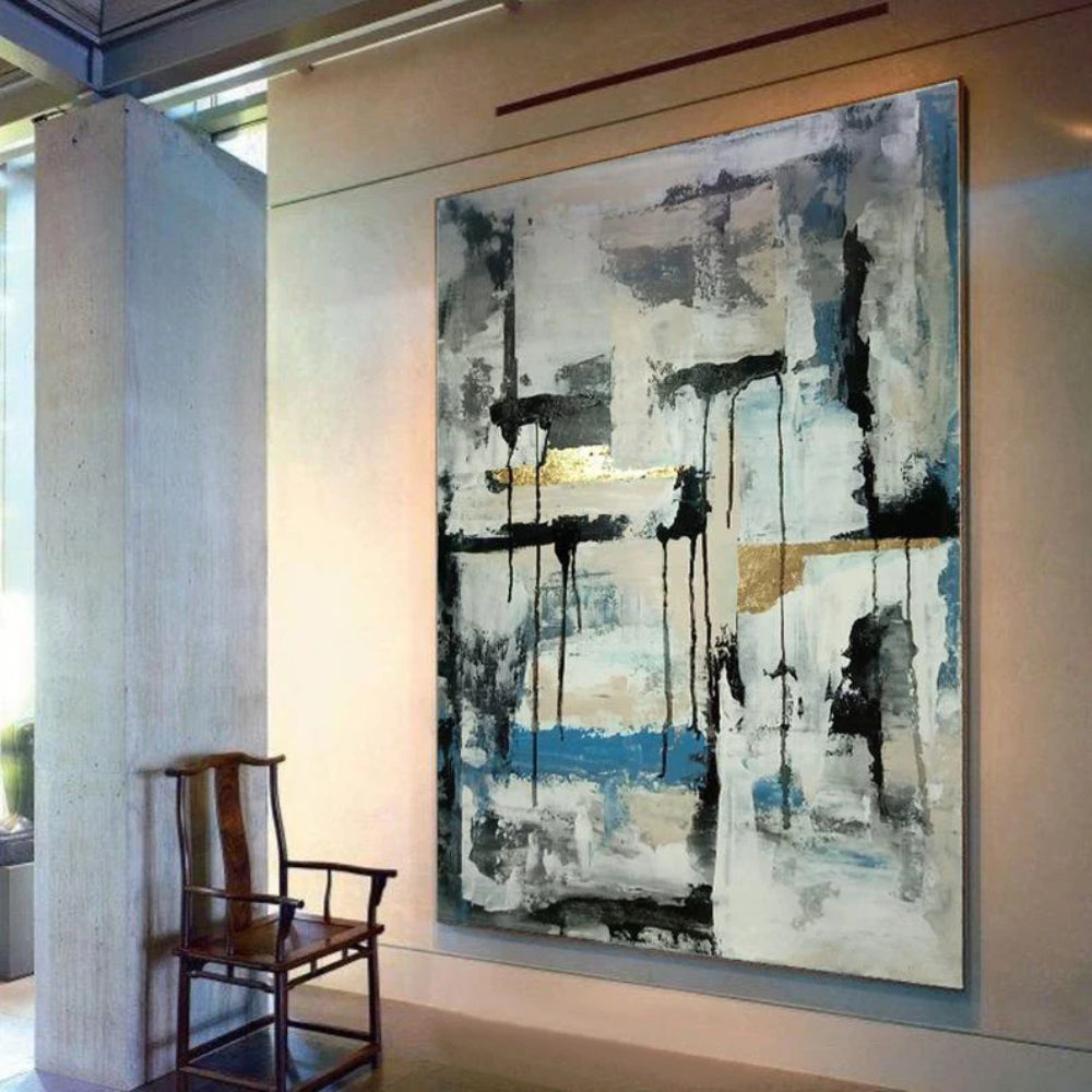 Room mockup showing black vertical drips and horizontal marks over pale grey-white fields with a blue band and small gold-coloured accents.