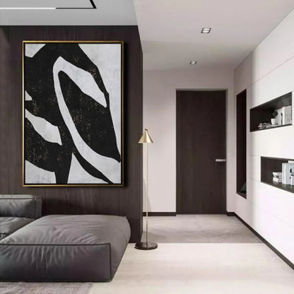 Room mockup. A broad black field crossed by a large irregular white sweeping loop and pale angular edges.