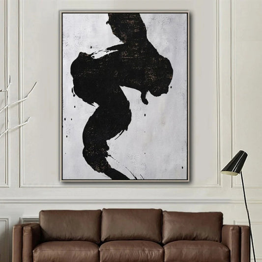 Room mockup. A thick winding black brushstroke with ragged edges and small splashes on pale grey.