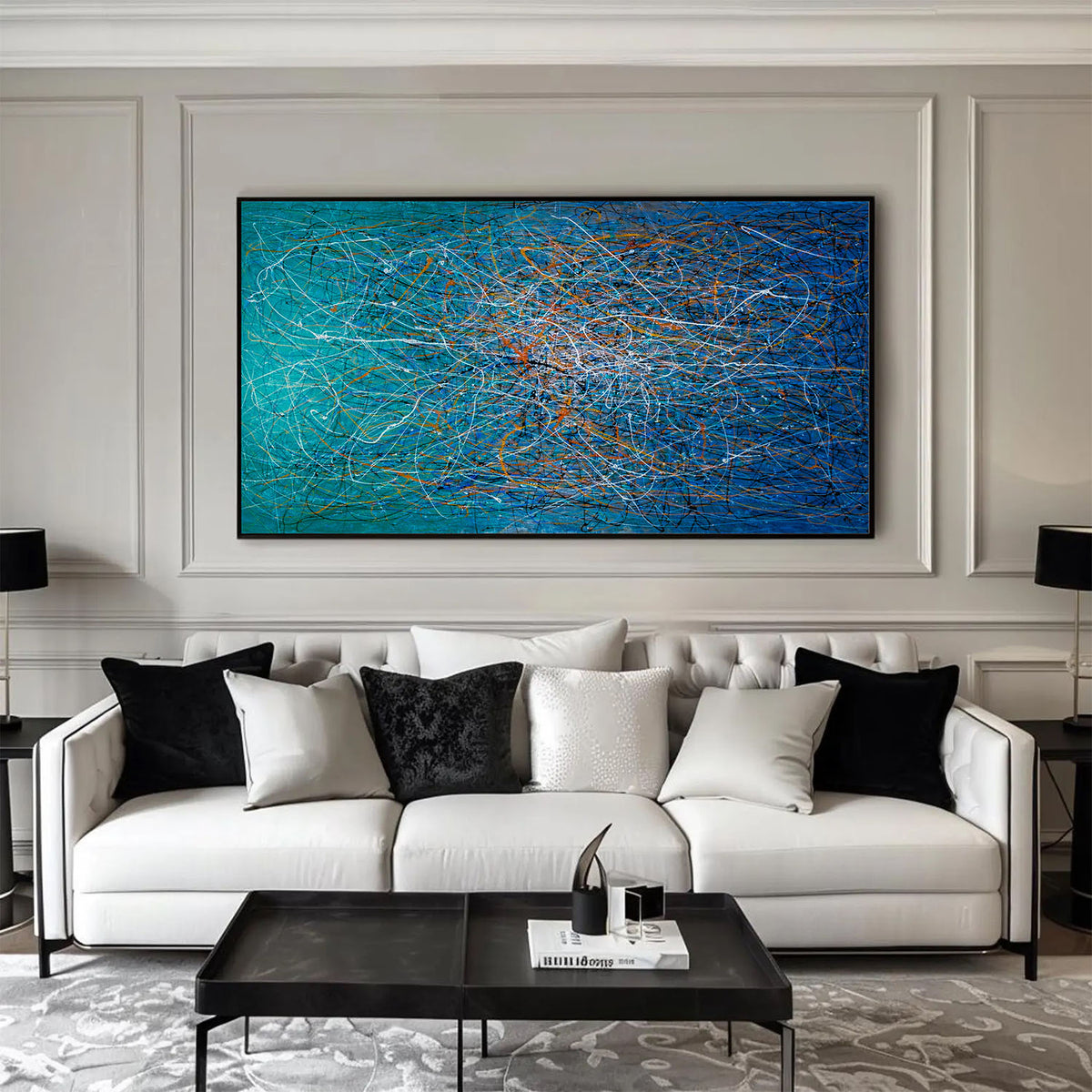 Horizontal abstract expressionist artwork in teal and blue tones displayed in a modern living room setting.