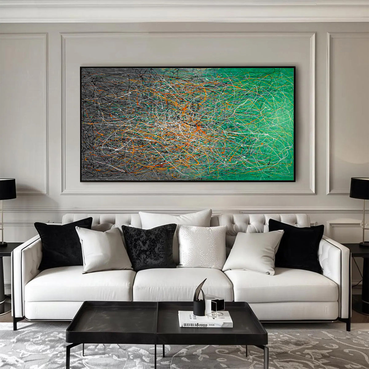 Horizontal abstract expressionist wall art in green and grey tones displayed above a white sofa in a modern living room.