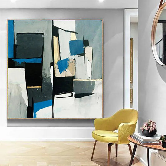 Room mockup. Overlapping black, grey, cream and blue rectangular shapes with rough edges form an angular abstract composition.