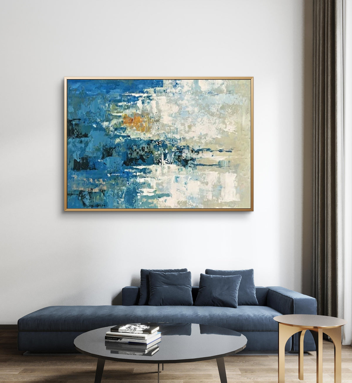 Room mockup showing textured abstract painting with deep blue and cream fields, a dark central band and small ochre accents.