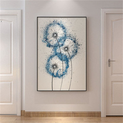 Room mockup. Three blue dandelion-like seed heads on fine dark stems, with scattered blue speckles against pale cream.