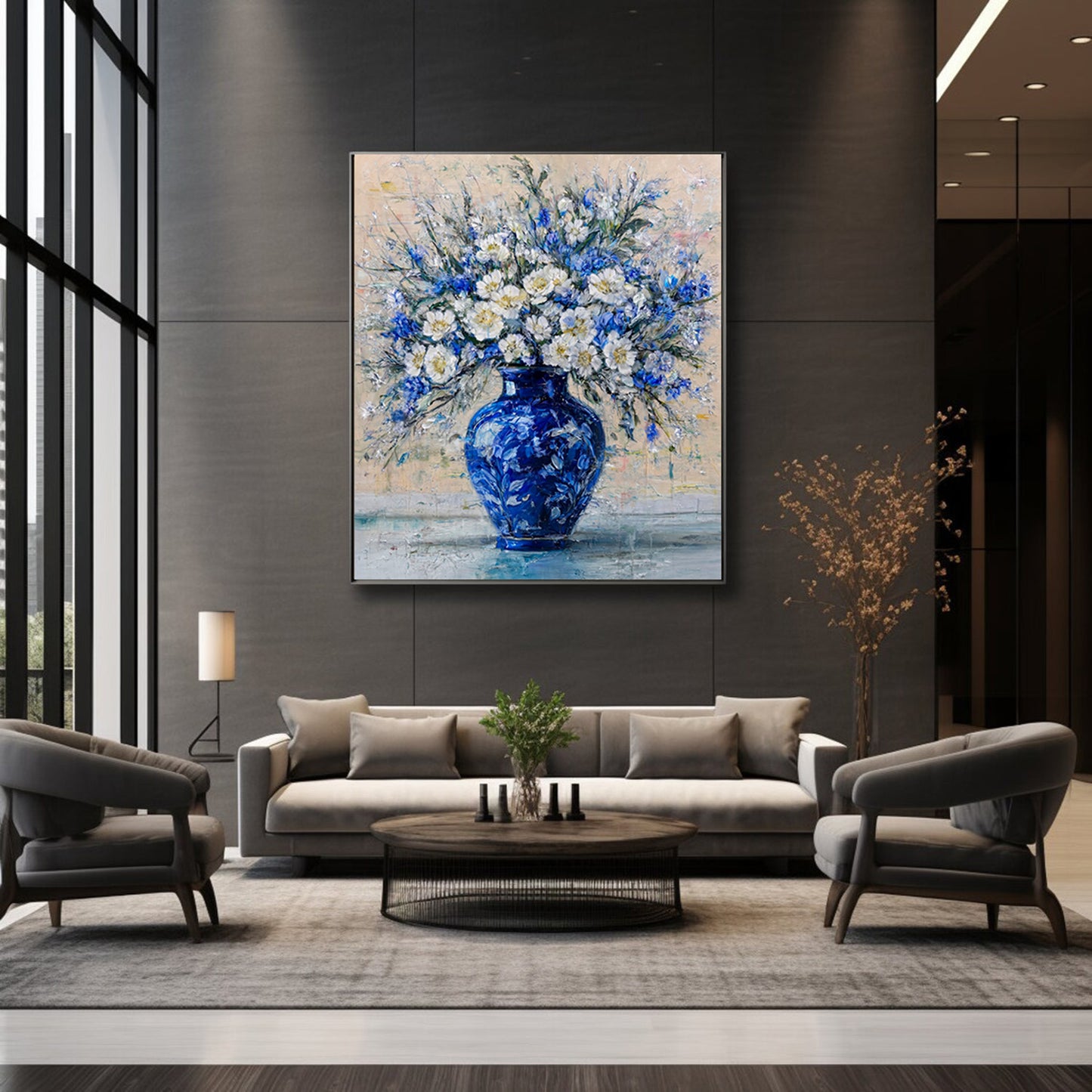 Hand-painted blue floral artwork displayed in luxury dark living room with modern furniture and statement wall