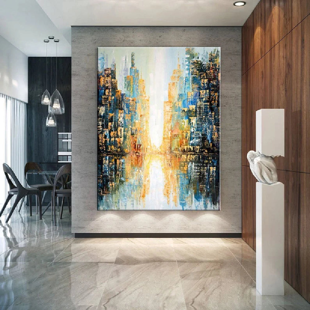 Room mockup showing abstract blue and dark navy city buildings with gold-coloured accents flanking a bright cream central passage and reflections.