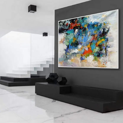 Room mockup. Layered blue, green, orange, yellow and black patches break across pale grey and white textured strokes.