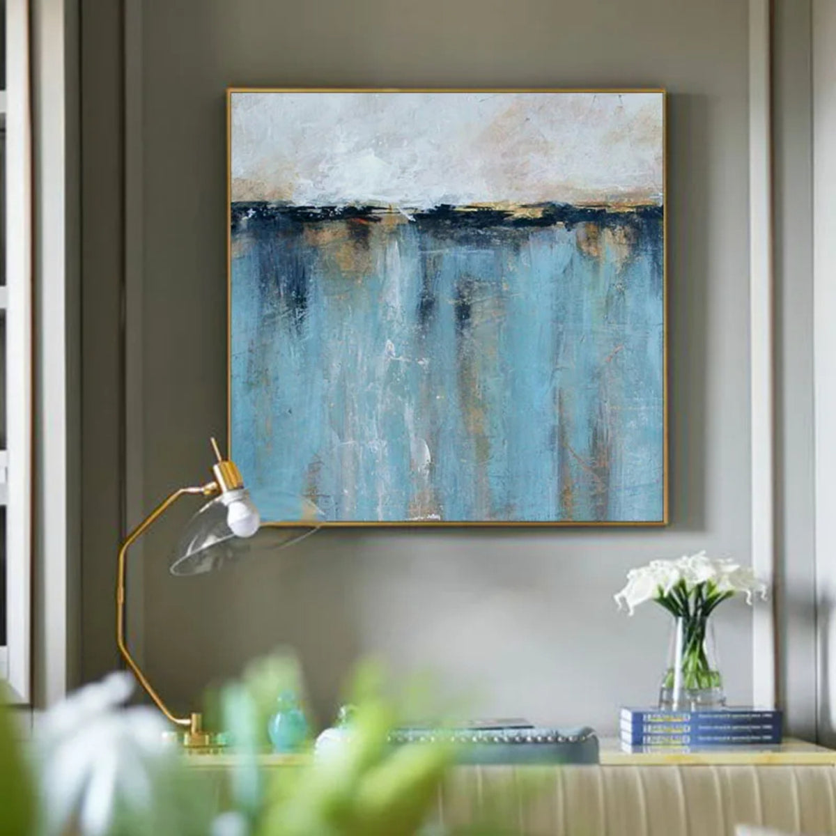 Room mockup. Pale grey above a dark blue horizon, with blue vertical strokes and small gold-coloured accents below.