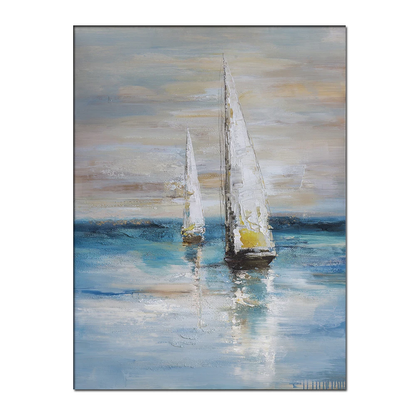 White-sailed boats reflected in blue and grey water beneath a softly streaked grey sky.