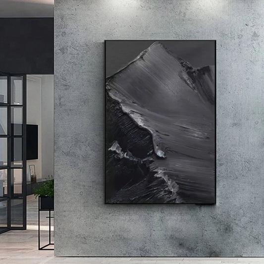 Room mockup showing charcoal grey textured abstract with broad sweeping raised strokes over deep black areas.