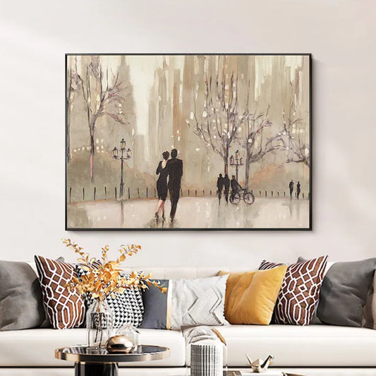 Room mockup. A couple walks through a muted beige park among bare trees, streetlamps, distant figures and a bicycle.