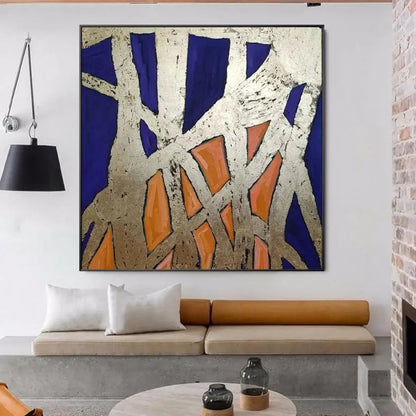 Room mockup. Rough pale cream intersecting strips form an angular web over deep blue and orange geometric patches.