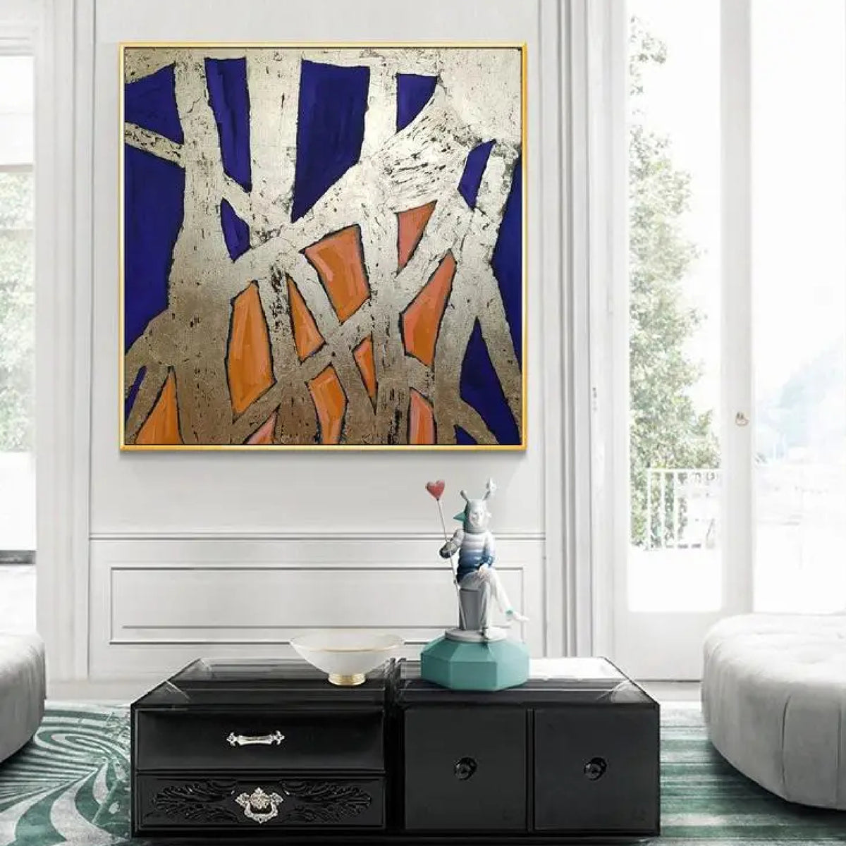 Room mockup. Rough pale cream intersecting strips form an angular web over deep blue and orange geometric patches.