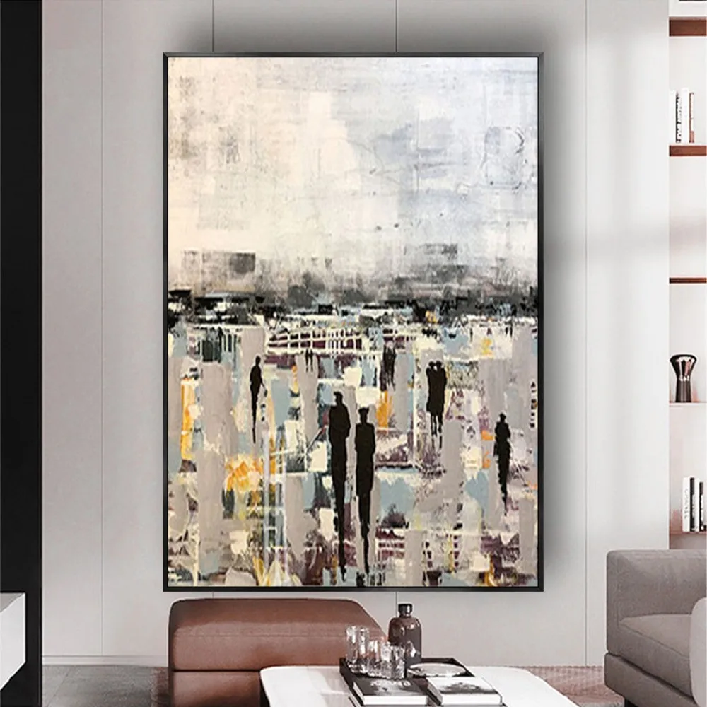 Room mockup showing abstract city scene with small dark figures, vertical grey and cream forms and scattered yellow accents.