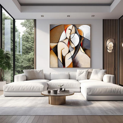 Modern living room with a white sofa, abstract painting, and round coffee table.