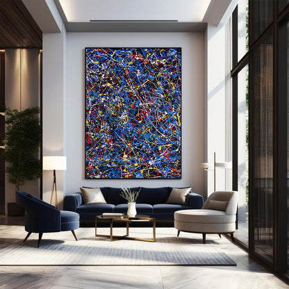 Modern living room with abstract painting, sofa, and chairs.