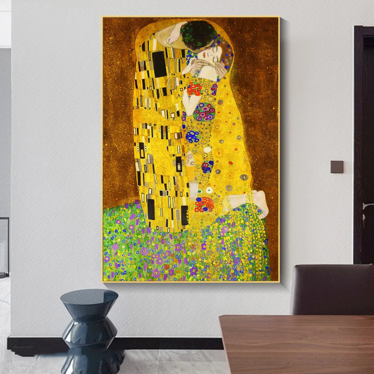 Room mockup showing embracing couple in patterned golden robes on flower-dotted green ground against a warm brown background.
